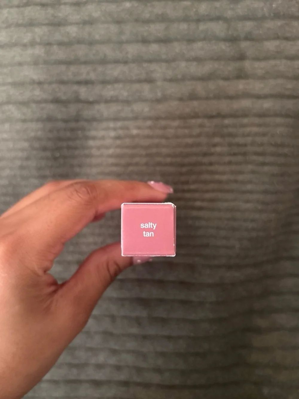 rhode Peptide Lip Tint in shade: “Salty Tan”